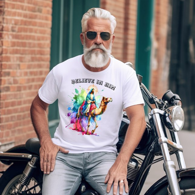 Jesus riding a camel through a vibrant landscape T-Shirt (Creator Uploaded)