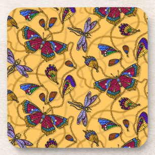 Jewellery butterflies and dragonflies on yellow coaster