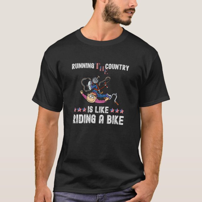 Joe Biden Falling Off His Bicycle Funny Biden Fall T-Shirt (Front)