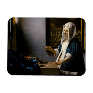 Johannes Vermeer - Woman Holding a Balance Magnet