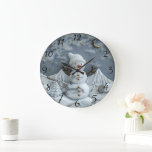 Jolly Christmas Snowman Delight Large Clock<br><div class="desc">A charming snowman with a cheerful expression and a cosy hat stands proudly amid a serene winter landscape. Majestic mountains create a stunning backdrop,  while delicate stars twinkle in a night sky. A miniature tree enhances the festive atmosphere.</div>