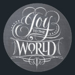 JOY Chalkboard Christmas Calligraphy Lettering Classic Round Sticker<br><div class="desc">JOY TO THE WORLD. Whenever I sing this Christmas carol, the 'Joy' portion is always so much fun. It comes out in full strength and with… JOY. That was the inspiration for this marvellous piece of chalk calligraphy art by professional lettering artist Ivan Angelic. This is the chalkboard version, there...</div>