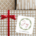 Joy Typography Script Christmas Wreath Holiday Square Sticker<br><div class="desc">Send out this year's holiday greetings in style with these unique and modern holiday stickers. The design features a festive typography script "Joy" inside a watercolor foliage wreath. These stickers can be used as envelope seals, Christmas gift tags, holiday party favour stickers, and much, much more! Easily add your custom...</div>