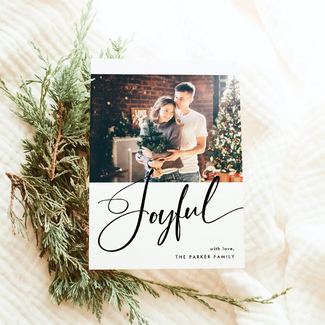 Joyful | Elegant Script and Two Photos Christmas Holiday Card (An elegant black and white Christmas photo card that says "joyful" in modern calligraphy)
