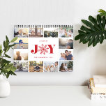 Joyful Year | 2019 Photo Calendar<br><div class="desc">Share a favourite memory on each page of this 2019 photo calendar. Cover features a thumbnail version of each photo with "a year of joy" in the centre in festive red lettering. A red snowflake takes the place of the "O" for extra holiday cheer. Personalise the cover with your name(s)...</div>
