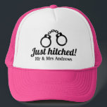 Just hitched handcuffs trucker hat for newly weds<br><div class="desc">Just hitched handcuffs trucker hat for newly weds couple. Cute handcuffed design with hearts and script typography. Add your own bride and groom name or Mr and Mrs surname. Funny gift idea for newlyweds and recently married honeymooners. Also great for bridal shower,  bachelorette party,  engagement,  girl's night out etc.</div>