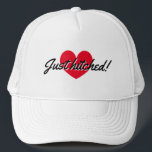 Just hitched trucker hat for newly weds couple<br><div class="desc">Just hitched trucker hat for newly weds couple. Cute red heart design with script typography. Add your own bride and groom name plus date of marriage optionally.</div>
