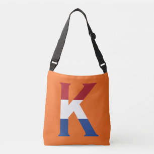 K Monogram overlaid on NLD Flag on or cbbcnt Crossbody Bag