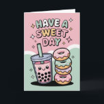 Kawaii Pastel Boba Tea and Doughnuts Sweet Birthda Card<br><div class="desc">Send some sweetness her way with this adorable Kawaii birthday card! Featuring a cute smiling boba tea and pastel-coloured doughnuts on a soft mint and pink background, this design is inspired by Japanese pop culture and "sweet" aesthetics. It's the perfect choice for a daughter, bestie, or any boba lover. Fully...</div>