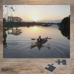 Kayaker on Serene Lake Waters Sunrise Landscape Jigsaw Puzzle