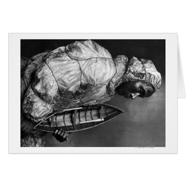 Kayaker wearing water-proof jacket with toy boat (Front Horizontal)