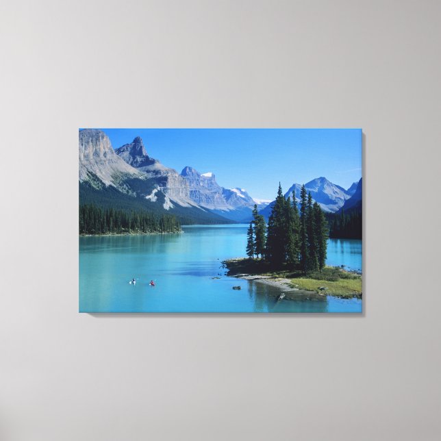 Kayaking on Maligne Lake at Spirit Island Canvas Print (Front)