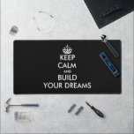 Keep calm and build your dream custom desk mat<br><div class="desc">Keep calm and build your dream custom desk mat. Custom desk mat for office or work bench. Personalise with your own funny Keep calm and carry on quote. Black and white or custom colour. Modern typography template.</div>