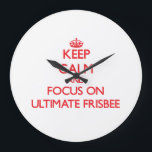 Keep calm and focus on Ultimate Frisbee Large Clock<br><div class="desc">Use the search tool at my store to find other ##EOF## merchandise. Keep calm and focus on Ultimate Frisbee products available on tshirts, sweatshirts, kids shirts, infant onsies, stickers, magnets, and much more ##EOF## clothing fully customisable to your specifications. If you like what you see, please link to my store...</div>