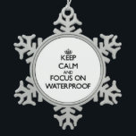 Keep Calm and focus on Waterproof Snowflake Pewter Christmas Ornament<br><div class="desc">Use the search tool at my store to find other Waterproof merchandise. Keep Calm and focus on Waterproof products available on tshirts, sweatshirts, kids shirts, infant onsies, stickers, magnets, and much more Waterproof clothing fully customisable to your specifications. If you like what you see, please link to my store (www.zazzle.com/thisandthatgifts)...</div>