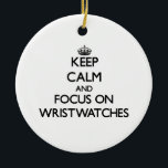 Keep Calm and focus on Wristwatches Ceramic Tree Decoration<br><div class="desc">Use the search tool at my store to find other Wristwatches merchandise. Keep Calm and focus on Wristwatches products available on tshirts, sweatshirts, kids shirts, infant onsies, stickers, magnets, and much more Wristwatches clothing fully customisable to your specifications. If you like what you see, please link to my store (www.zazzle.com/thisandthatgifts)...</div>