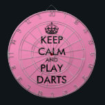 Keep calm and play darts funny pink dartboard<br><div class="desc">Keep calm and play darts funny pink dartboard. Personalise this dart board with your own funny meme. Trendy wall decor ideas for home,  pub,  car,  cafe,  restaurant,  man cave,  office and other places to relax. Modern typography template with crown. Pink or custom background colour.</div>