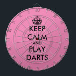 Keep calm and play darts funny pink dartboard<br><div class="desc">Keep calm and play darts funny pink dartboard. Personalise this dart board with your own funny meme. Trendy wall decor ideas for home,  pub,  car,  cafe,  restaurant,  man cave,  office and other places to relax. Modern typography template with crown. Pink or custom background colour.</div>
