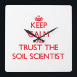 Keep Calm and Trust the Soil Scientist Square Wall Clock<br><div class="desc">Use the search tool at my store to find other Soil Scientist merchandise. Keep Calm and Trust the Soil Scientist products avaiable on tshirts, sweatshirts, kids shirts, infant onsies, stickers, magnets, and much more Soil Scientist clothing fully customisable to your specifcations. If you like what you see, please link to...</div>