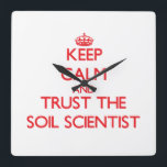 Keep Calm and Trust the Soil Scientist Square Wall Clock<br><div class="desc">Use the search tool at my store to find other Soil Scientist merchandise. Keep Calm and Trust the Soil Scientist products avaiable on tshirts, sweatshirts, kids shirts, infant onsies, stickers, magnets, and much more Soil Scientist clothing fully customisable to your specifcations. If you like what you see, please link to...</div>