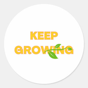 Keep Growing text design with a green vine Classic Round Sticker