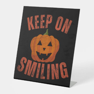 KEEP ON SMILING HALLOWEEN GIFT PEDESTAL SIGN