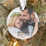 Keepsake Calligraphy 2 Photo First Christmas Ornament<br><div class="desc">Truly a keepsake ornament featuring your favourite wedding 2 photos,  calligraphy Mr & Mrs with connecting heart,  and your family name with the year 
overlaying the photos. Makes a loverly gift!!</div>