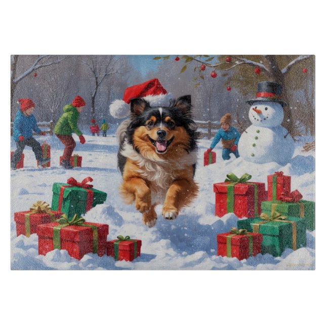Keeshond Dog Running in Snow with Christmas Hat Cutting Board (Front)