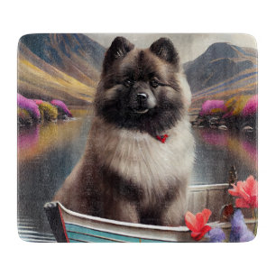 Keeshond on a Paddle: A Scenic Adventure Cutting Board