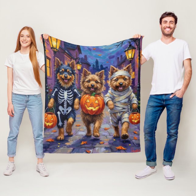 Keeshond Trick-or-Treating in Halloween Costumes Fleece Blanket (In Situ)