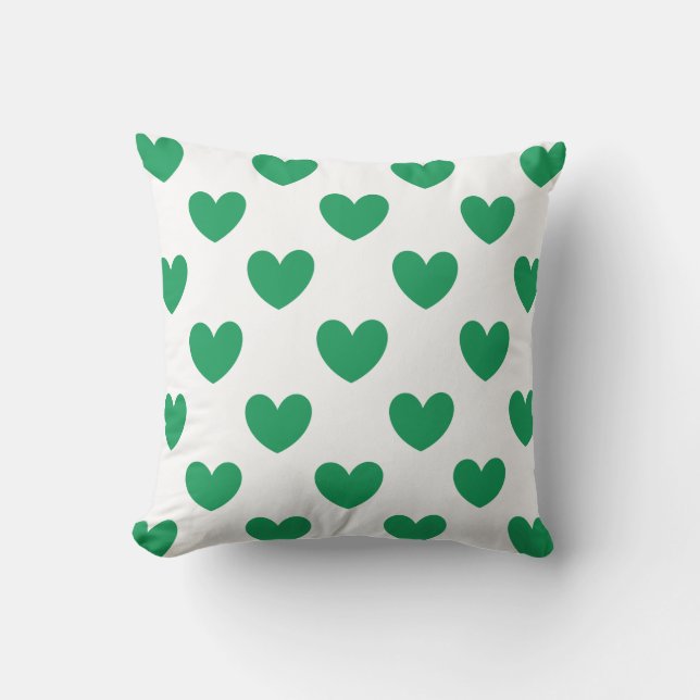 Kelly green polka hearts on white cushion (Front)