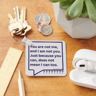 Keyring with thought poem quote 'You are not me'.