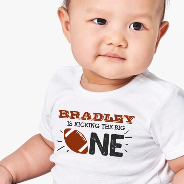 Kicking The Big One | Football 1st Birthday Baby T-Shirt (Creator Uploaded)