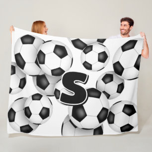 kids monogram overlying giant soccer balls fleece blanket
