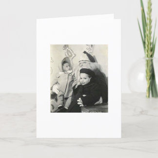 KIDS SITTING ON SANTA'S LAP FOR XMAS HOLIDAY CARD