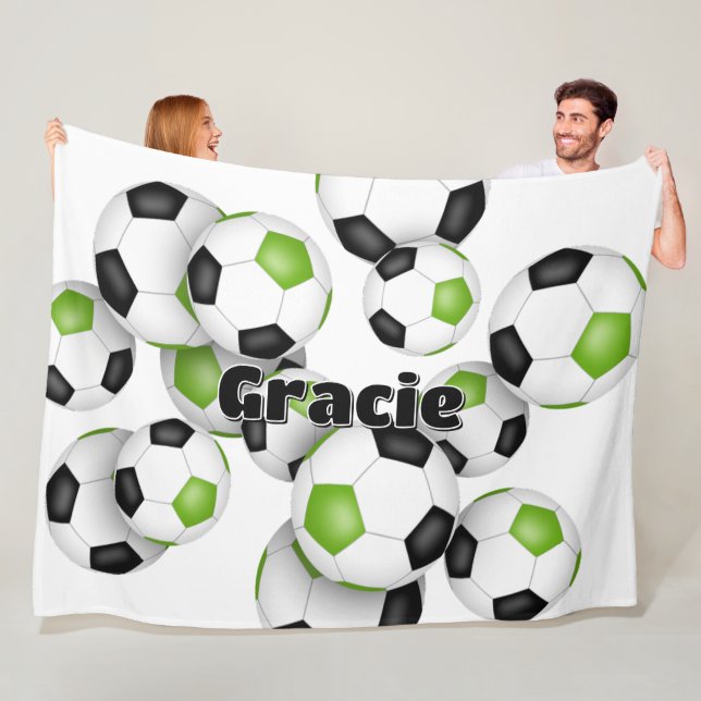 kids sports room bright green black soccer balls fleece blanket (In Situ)
