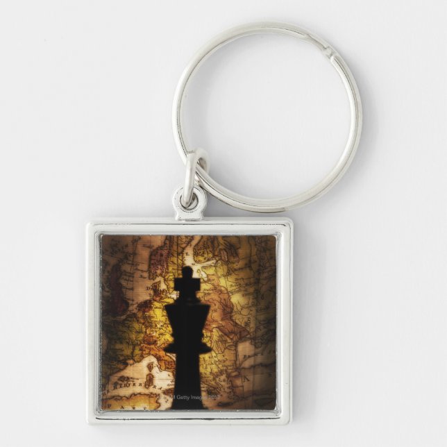 King chess piece on old world map key ring (Front)