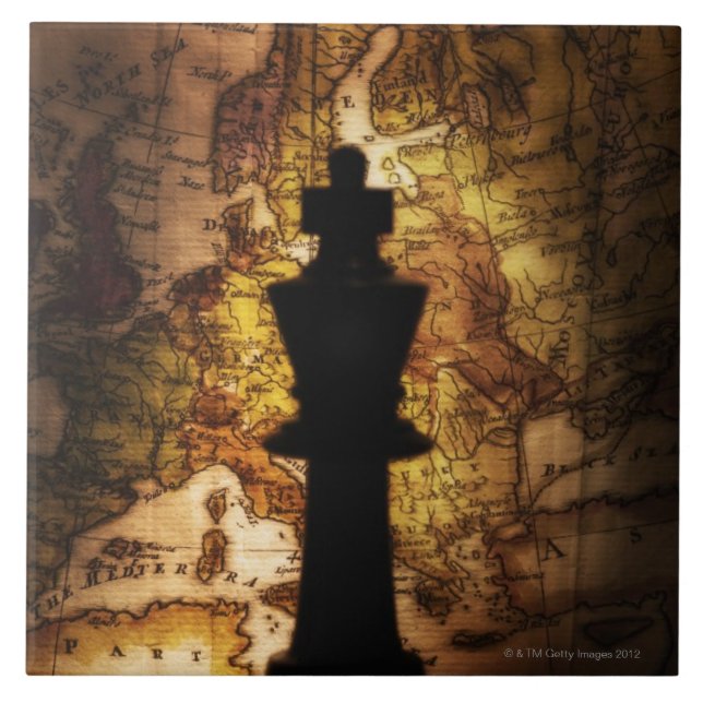 King chess piece on old world map tile (Front)