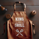 King of the Grill Funny Light Brown Grilling Apron<br><div class="desc">The perfect apron for the guy who reigns as the supreme monarch of his grill. Two crossed spatulas appear silhouetted in white under the words "King of the Grill" in white on a light brown background. Makes an ideal birthday or Father's Day gift.</div>