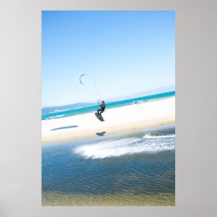 Kitesurfer boosts an air poster