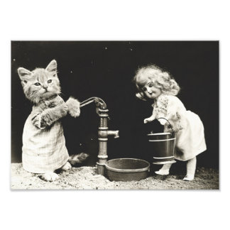 Kitten & Doll at Water Well Photo Print