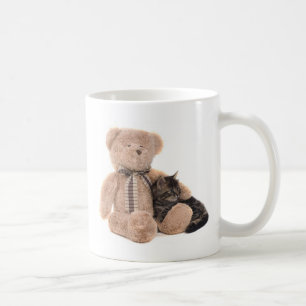 kitten in the arms of a teddy bear coffee mug