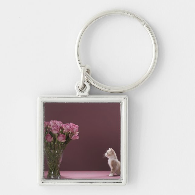 Kitten looking at vase of roses key ring (Front)