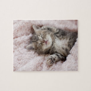 Kitten Sleeping on Towel Jigsaw Puzzle