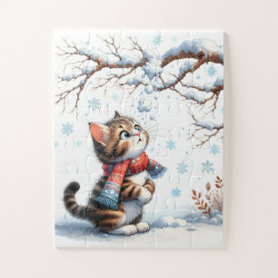 Kitten Watching Falling Snow from Branch Jigsaw Puzzle