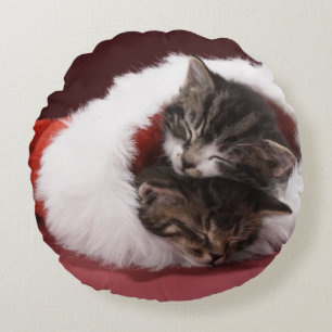 Kittens asleep together in Christmas hat Round Cushion