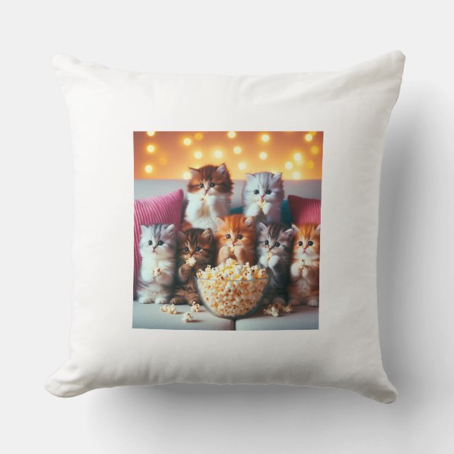 Kittens enjoy eating popcorn cushion (Front)