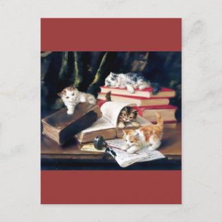 Kittens playing on a desk postcard