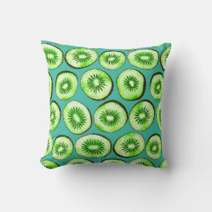 Kiwi slices on turquoise cushion