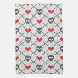Knitted pattern with skulls tea towel